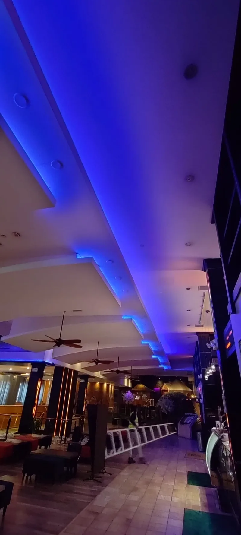 Commercial LED interior lighting result Blue LED cove lighting installed along a commercial interior ceiling in New York City