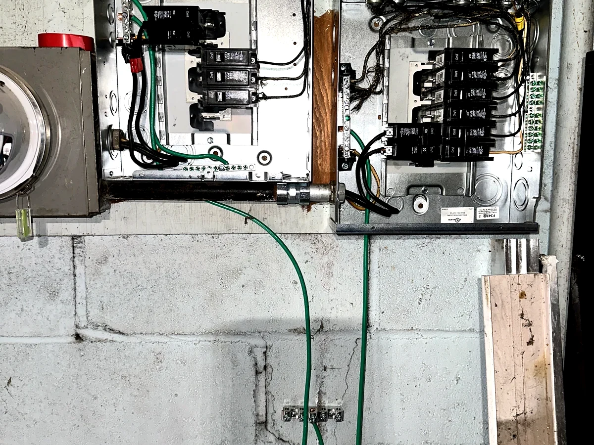 Example image of panel and grounding work related to building electrical maintenance.