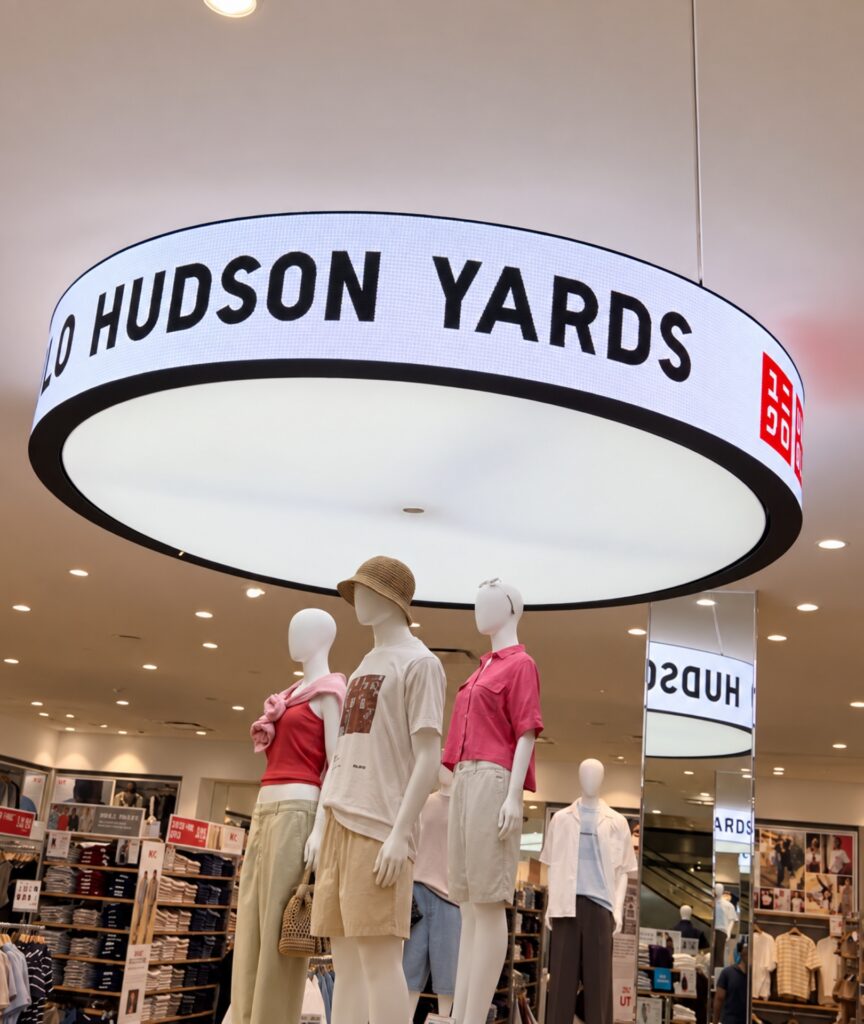 Suspended circular LED display in a retail store
